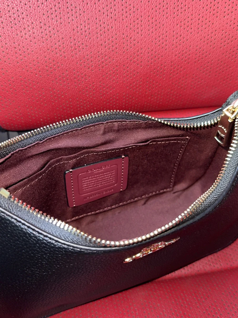 Coach Black Pebbled Leather Shoulder Bag with Gold Chain Accents